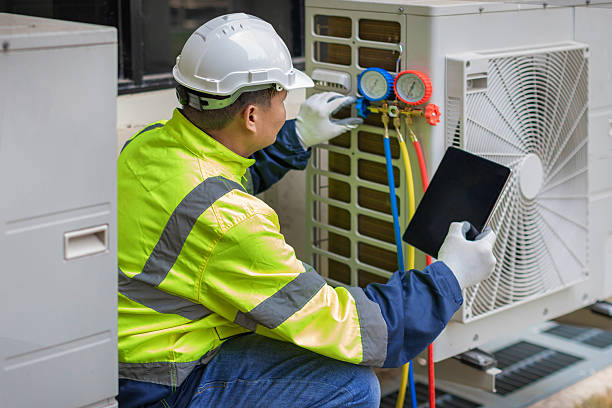 Professional Hvac technician working in Okahumpka, FL